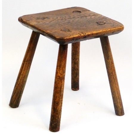 An 18th Century elm stool