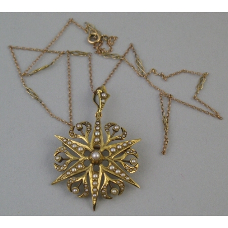 An Edwardian 15ct gold seed pearl pendant/brooch