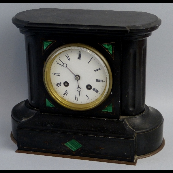 A late 19th century French black slate mantle clock