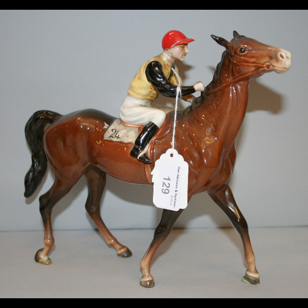 A Beswick horse and jockey group
