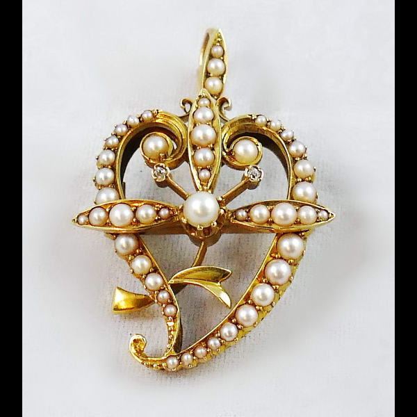 A Victorian 15ct gold pearl and diamond witches heart brooch/pendant
