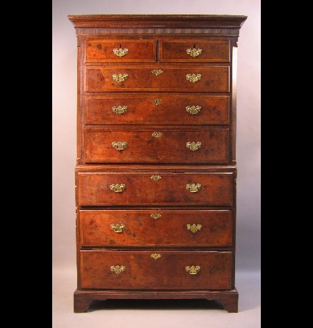 A George III walnut and mahogany chest on chest