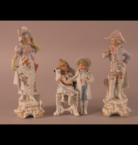 A pair of early 20th Century Continental porcelain male and female figures