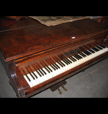 A walnut cased baby grand piano by F Rosener
