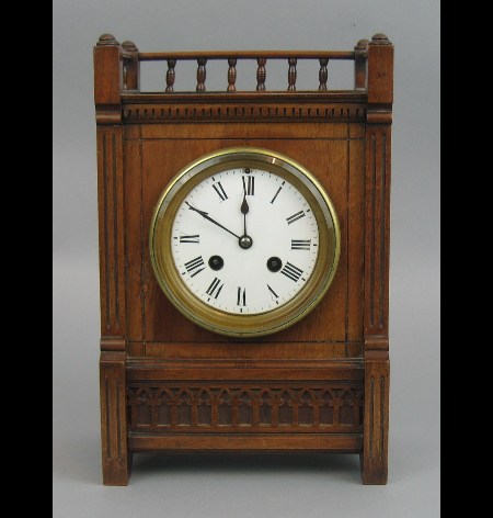 A late Victorian mahogany cased mantel clock