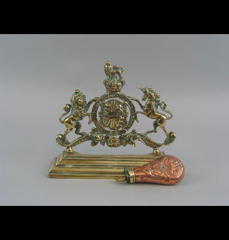 A 19th Century brass hearth piece