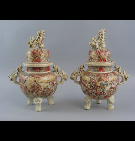 A pair of early 20th Century Satsuma covered urns