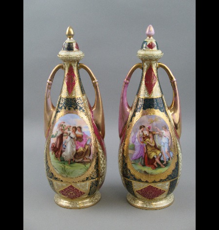 A pair of Vienna covered vases