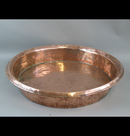 A large Victorian copper farmhouse bowl