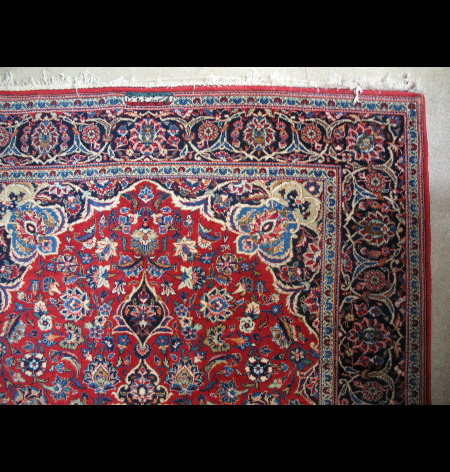 A mid 20th Century Persian Kashan rug