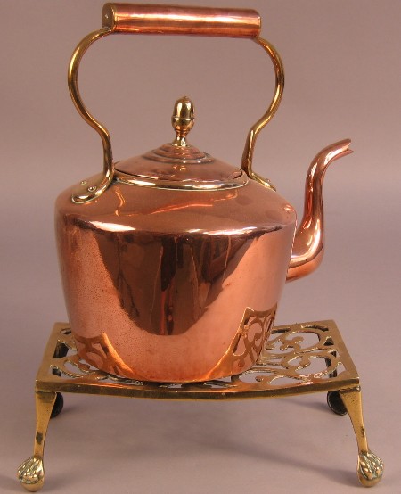 A 19th Century brass and copper kettle
